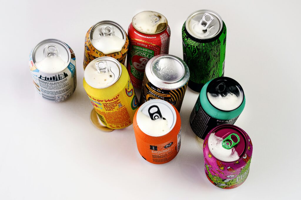 pexels-photo-3407777-3407777 A vibrant display of various open soda cans shot from above in London, England.